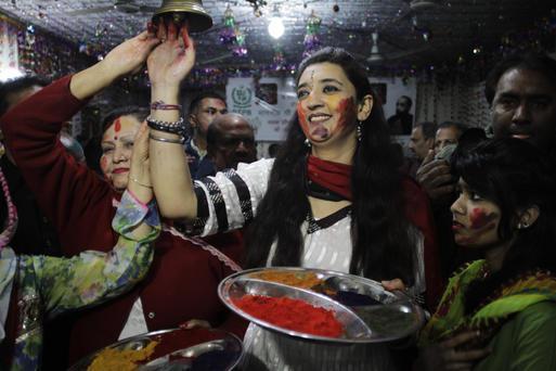 Pak. students act as human shield for Hindus celebrating Holi