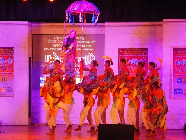 An artist ( Adivasi-Mulnivasi ) perfoming cultural dance during the 