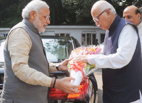 Prime Minister Narendra Modi greets L K Advani on his birthday