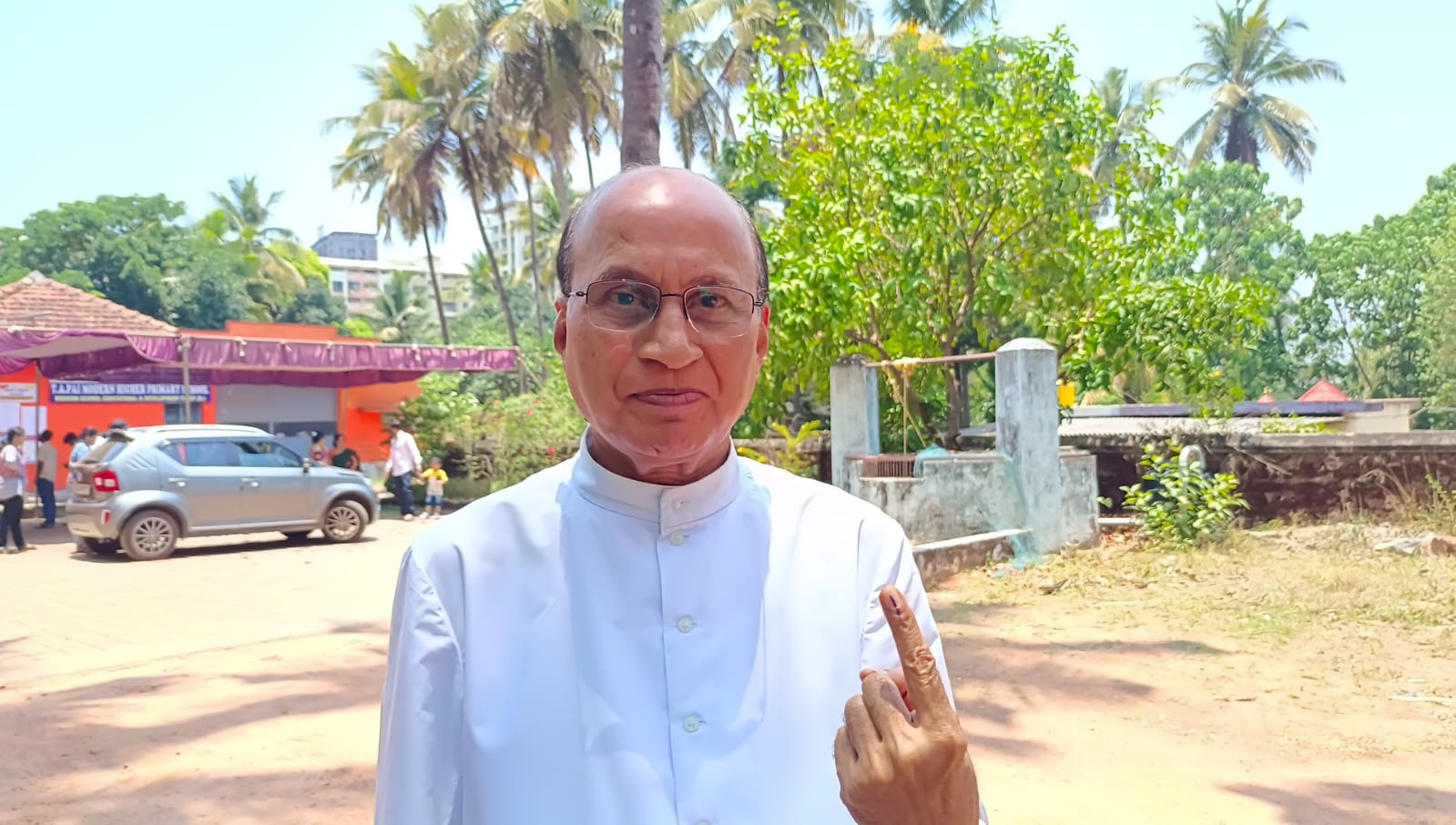 Bishop of Udupi diocese and pontiffs of Sri Krishna Math casts votes in their respective polling centers.
