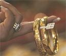 Gold down nearly 3 pc in futures trade on global cues