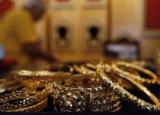 Gold prices drop 9%, biggest one-day fall in 30 years