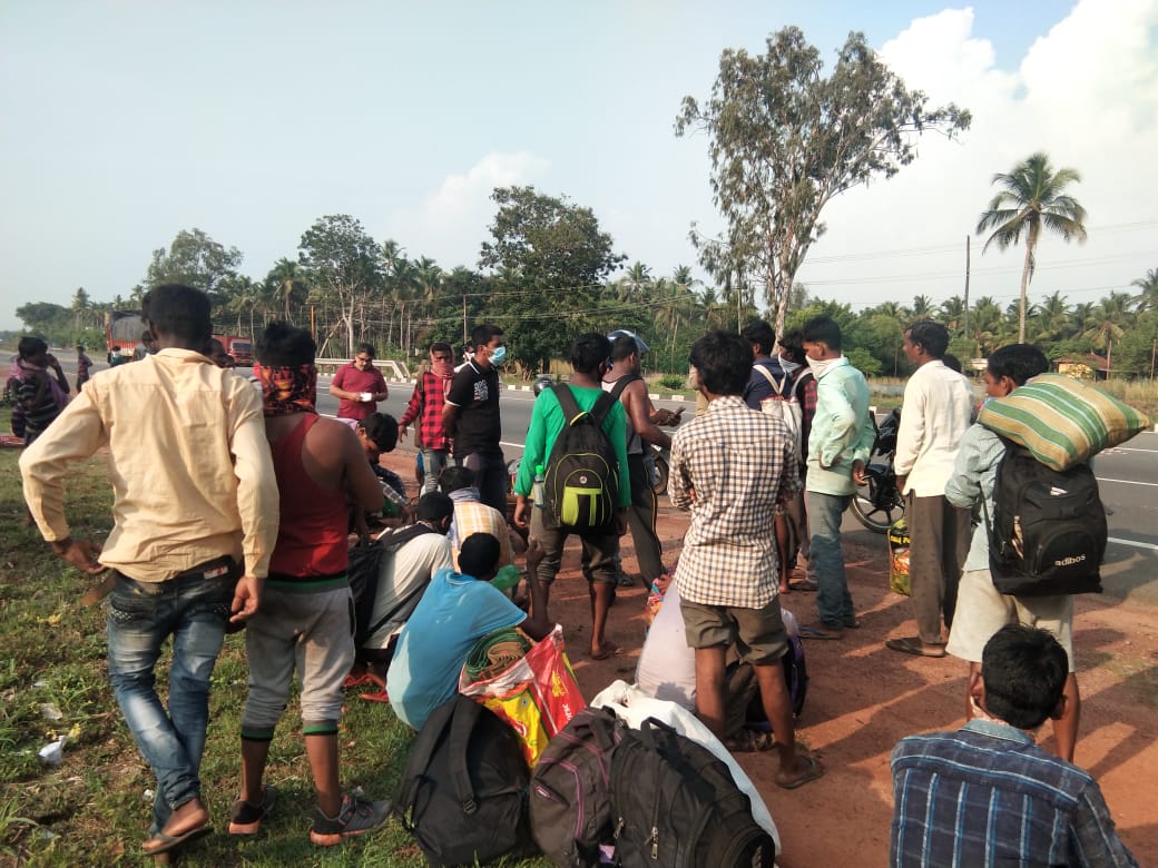 Migrant workers from Manipal walking towards Mangaluru stopped in Kaup, sent back