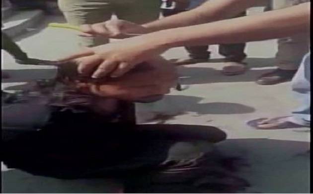 UP: Locals shave youth’s head in presence of policemen, video goes viral