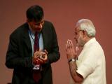 Rajan wins over Modi despite broad mistrust
