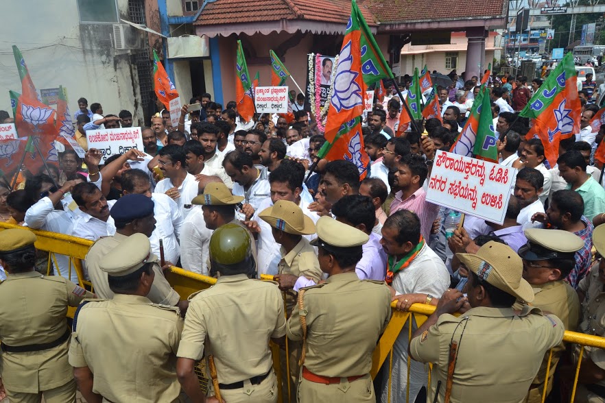 BJP staged protest against the City Municipal Commissioner D Manjunathaih