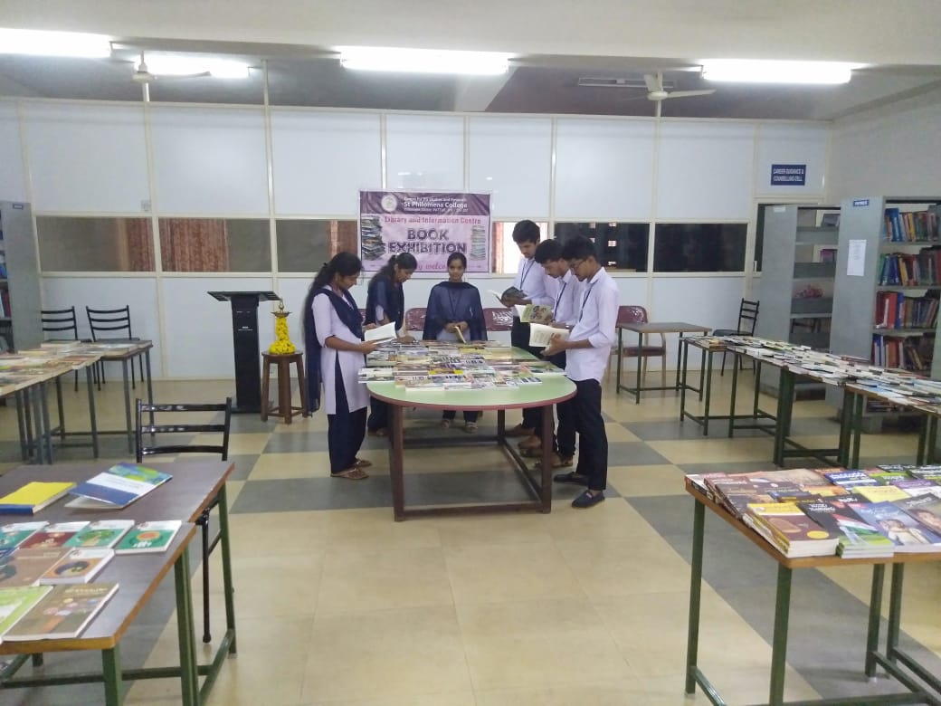 Book Exhibition held at PG Library of St Philomena College Puttur