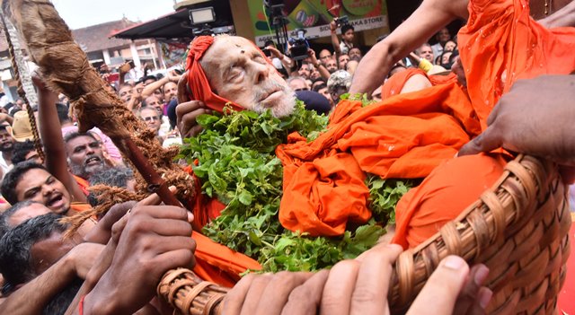 Sea of Devotees throng to pay their Last Respects to Pejwar Swamiji