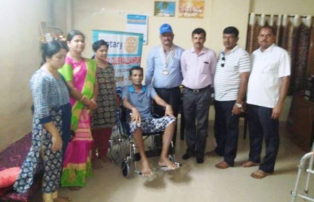 wheelchair to Mr Vijay Kumar Mendon by Kallianpur Rotarians