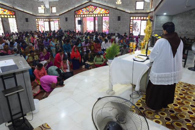 Special prayers for those working abroad offered at Infant Jesus