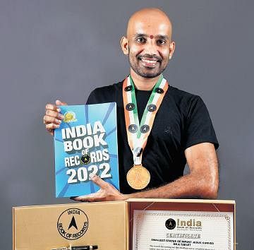 Kerala man carves baby Jesus on Dolo tablet, enters record books Kerala man carves baby Jesus on Dolo tablet, enters record books