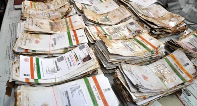 ADHAAR cards found in scrap; postman suspended