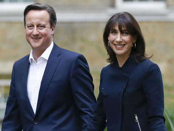 David Cameron returns to 10 Downing Street to prepare for another term as Prime Minister