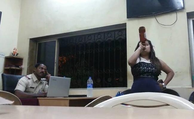 Woman Drinks Beer Inside Police Station, Abuses Cops; Video Goes Viral