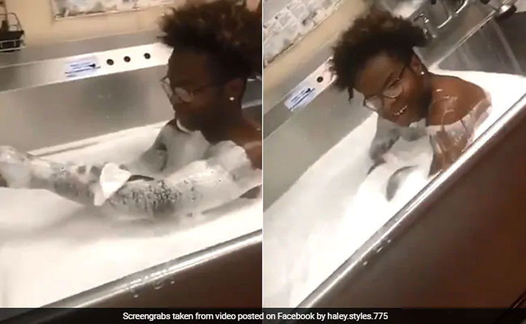 Outrage after viral video shows restaurant employee bathing in kitchen